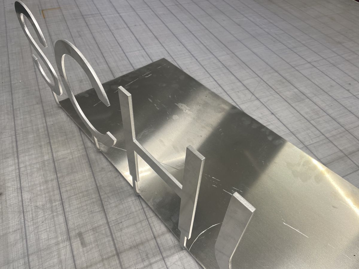Insegne: Aluminiumschrift Schule – Nuovo (secondo la descrizione) da Sursee venduto da Schriftgestalter 2