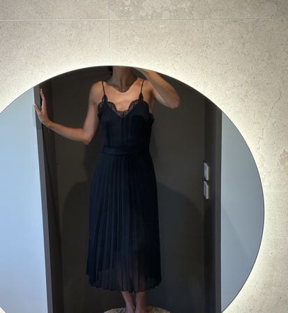 Elegant black Sandro midi-dress