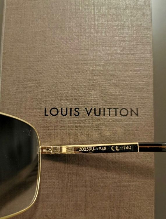 Louis Vuitton The Party Sonnenbrille in Gold/Silber - Ankauf