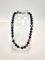 Halskette schwarz mit silbernen Charms