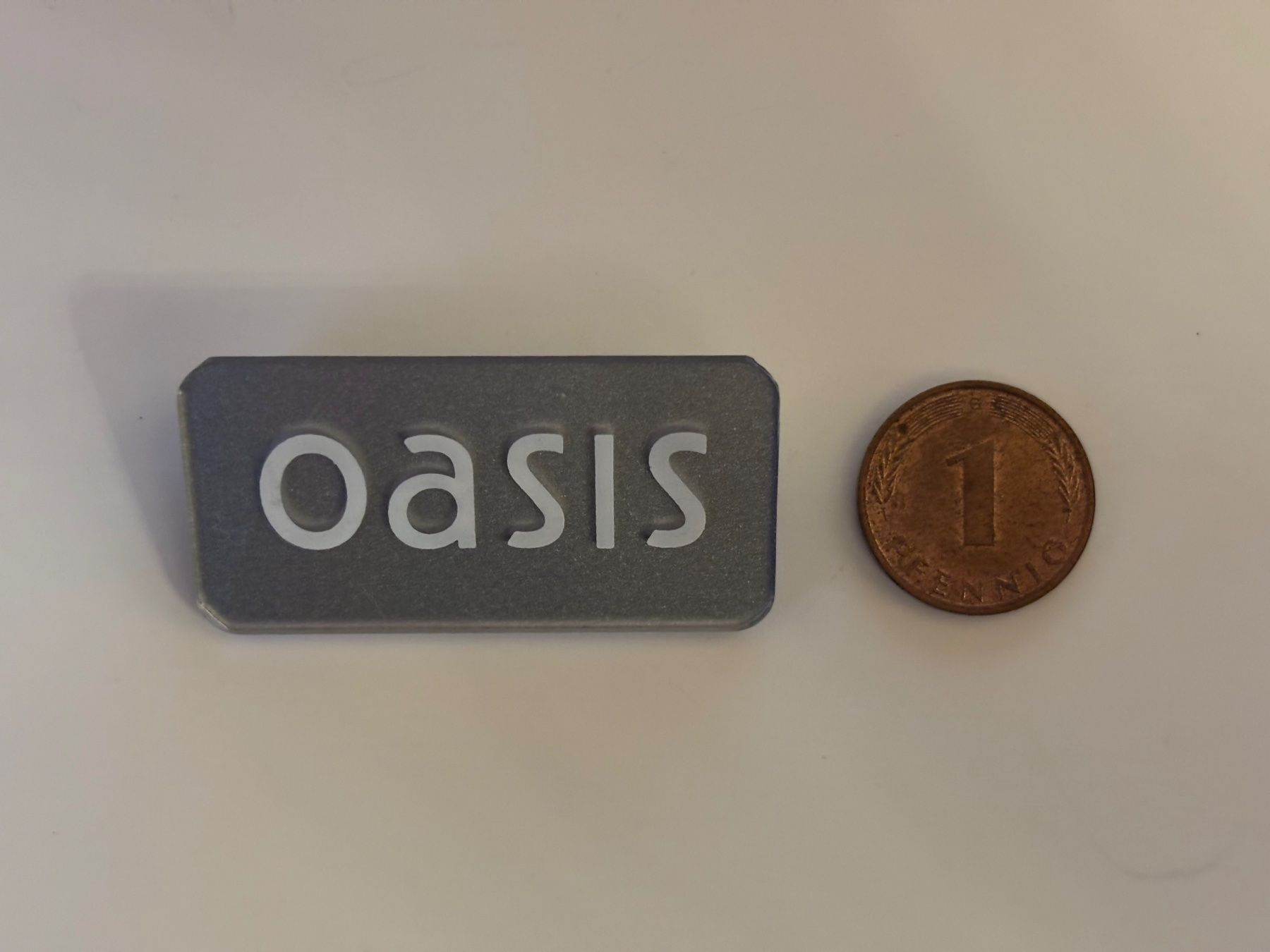 Placchette & Badge: Anstecknadel mit Schild "Oasis" – Usato da Zürich venduto da jas_5mwh 2