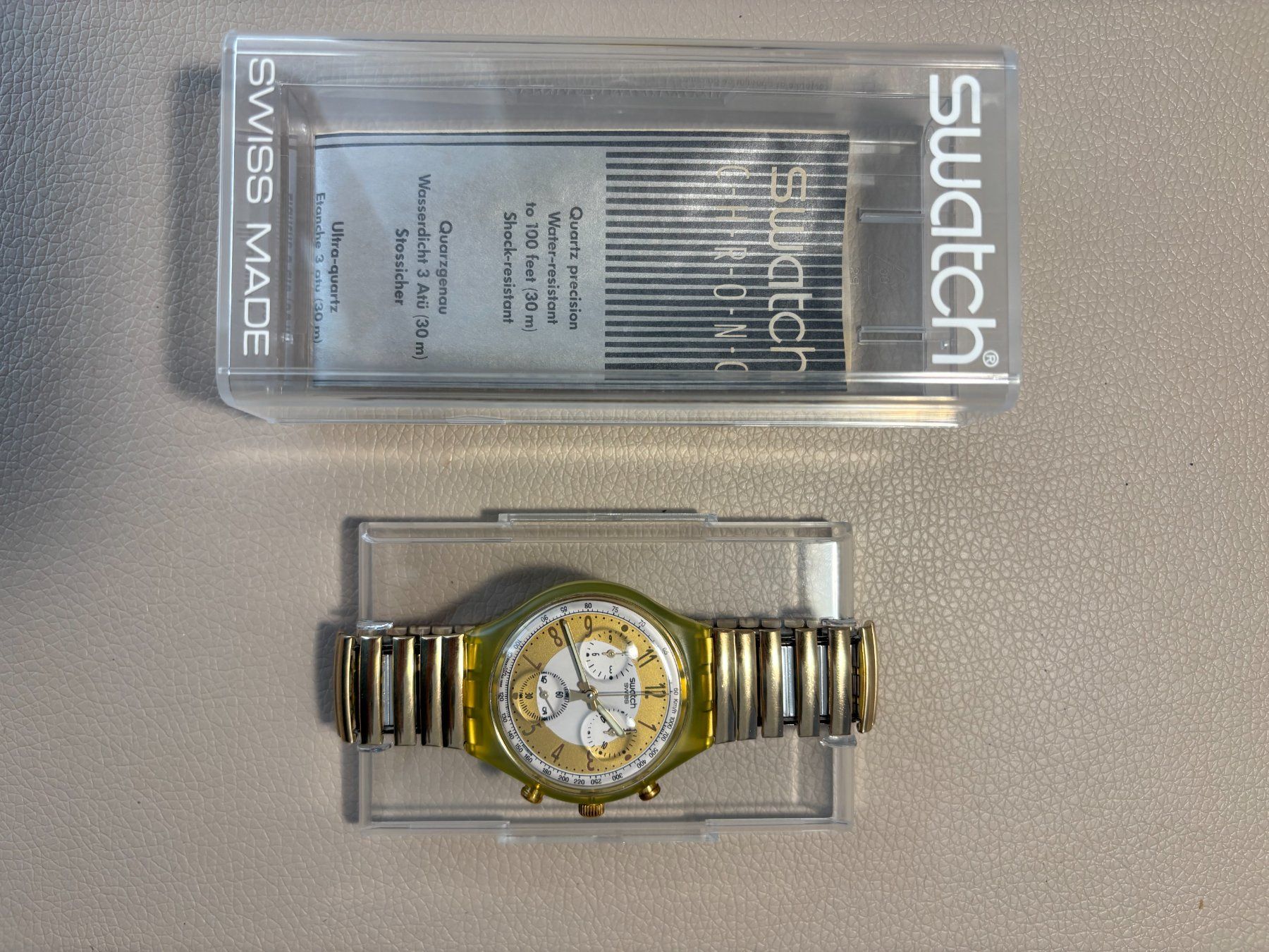 Swatch Orologi: Swatch SCG 100 Golden Globe – Nuovo e nell'imballaggio originale da Jona venduto da Greifzu