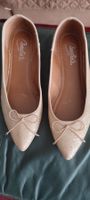 Chaussures dorées
