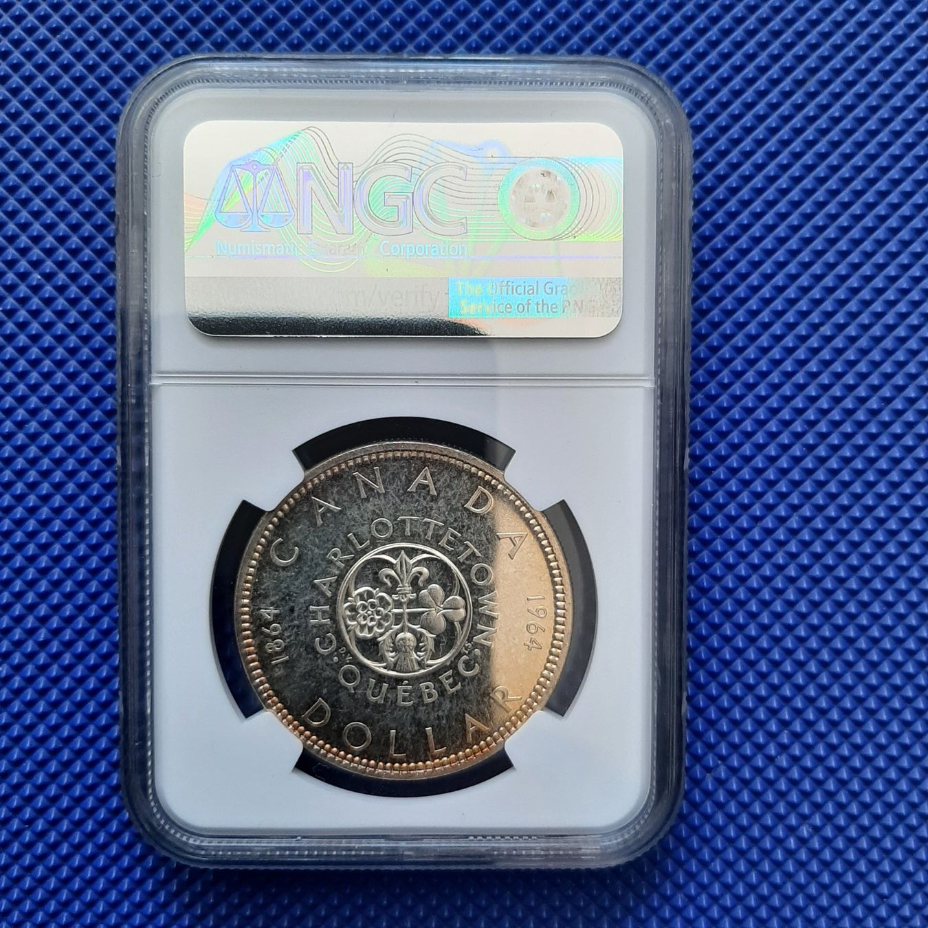 Tutti le monete: 1964 Canada Dollar NGC PL65 Charlottetown – Nuovo e nell'imballaggio originale da Carouge GE venduto da cecob0909 1