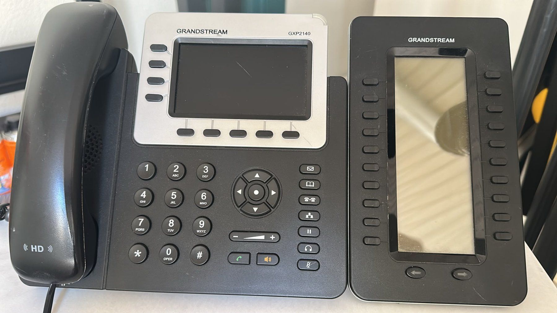Telefone: Grandstream GXP2140 IP-Telefon mit Erweiterungsmodul – Gebraucht aus St. Gallen von hem_q5dw
