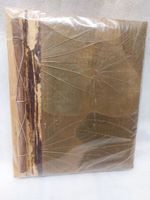 Photo frame / Book made of wood and natural leaves