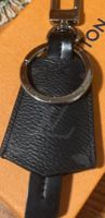 Porte-clés de luxe en cuir noir - Élégance discrète