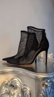 schicke transparente Stiefeletten
