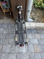 Porte-bagages vélo avec feu arrière aluminium noir
