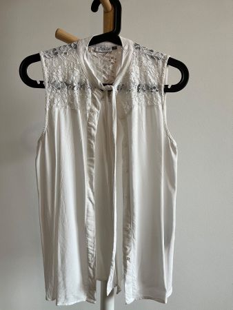 Weisse Bluse ärmellos 34