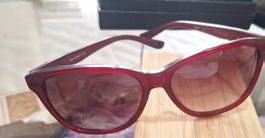 Lunettes de soleil rouges, bon état