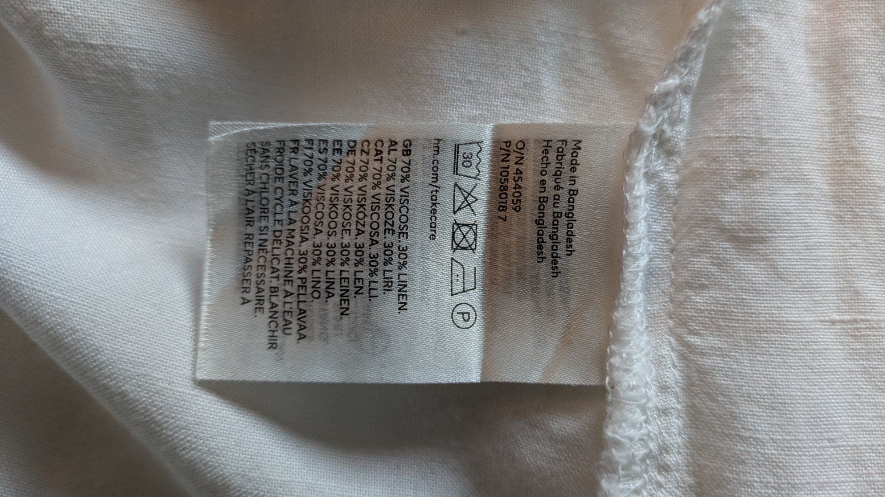 H&M Robes: Tunica/camicetta bianca con scollo a V – D'occasion à Claro par Dona1785 4