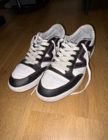 Schwarz-weiße Vans Low-Top Sneaker