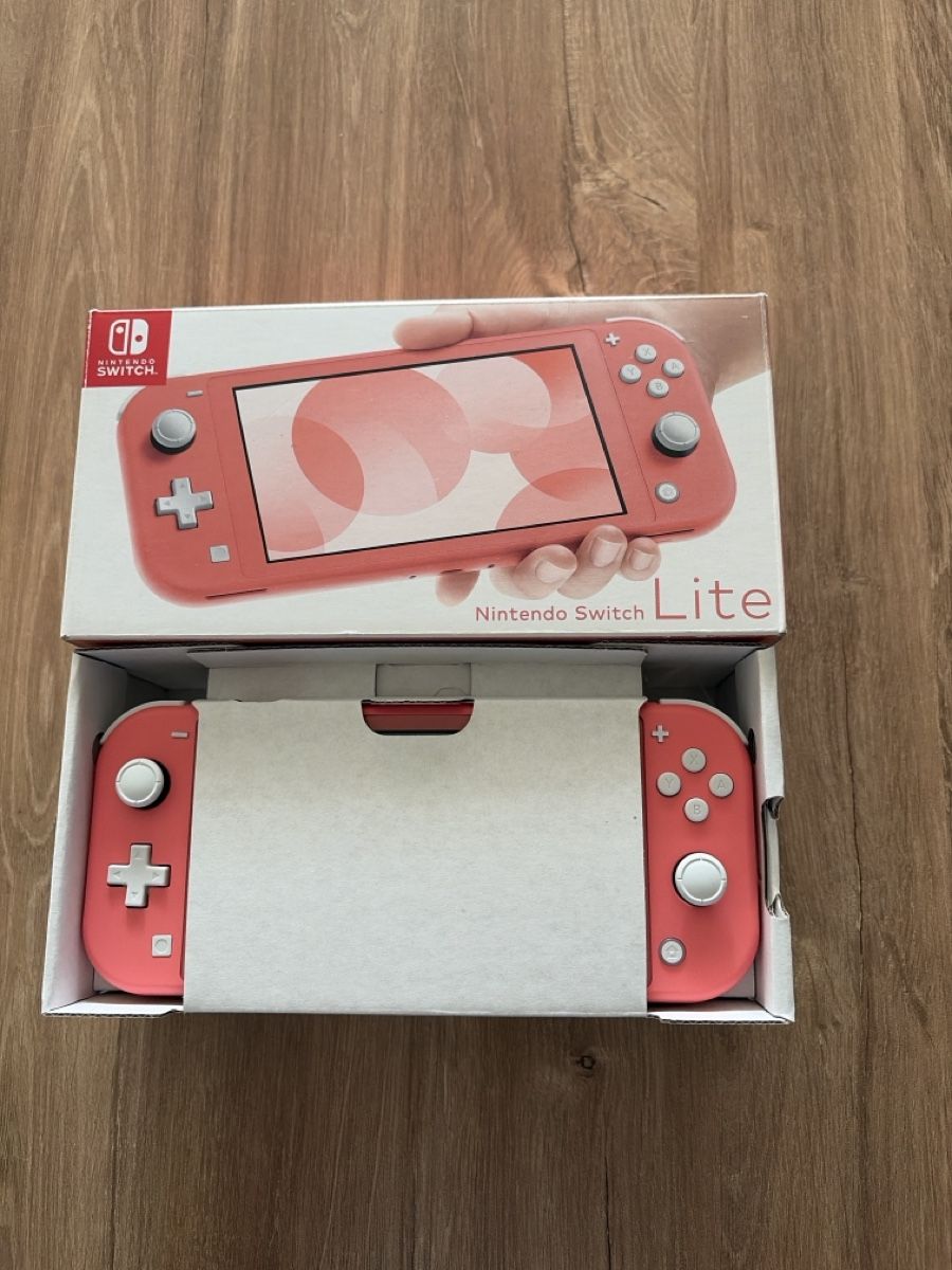 Nintendo Console: Nintendo Switch Lite Koralle - Inkl. Originalverpackung – Nuovo e nell'imballaggio originale da Schlieren venduto da tolga212