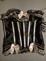 Corsetto nero gotico con fiocchi rosa taglia M buone condizi
