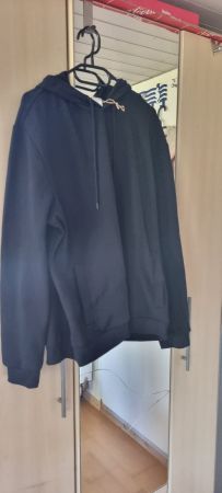 Schwarzer Hoodie "We Care" - neu für Her...