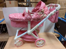 Schicker Puppenwagen in Rosa mit Rosenmuster