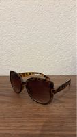 Lunettes de soleil motif écaille