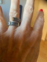 Magnifique bague argentée