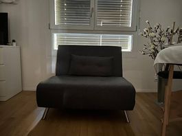 Grauer Schlafsessel / Klappsofa  wie neu