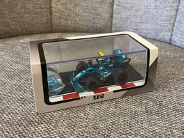 Aston Martin AMR22 Sebastian Vettel mit Fahrer 1/64