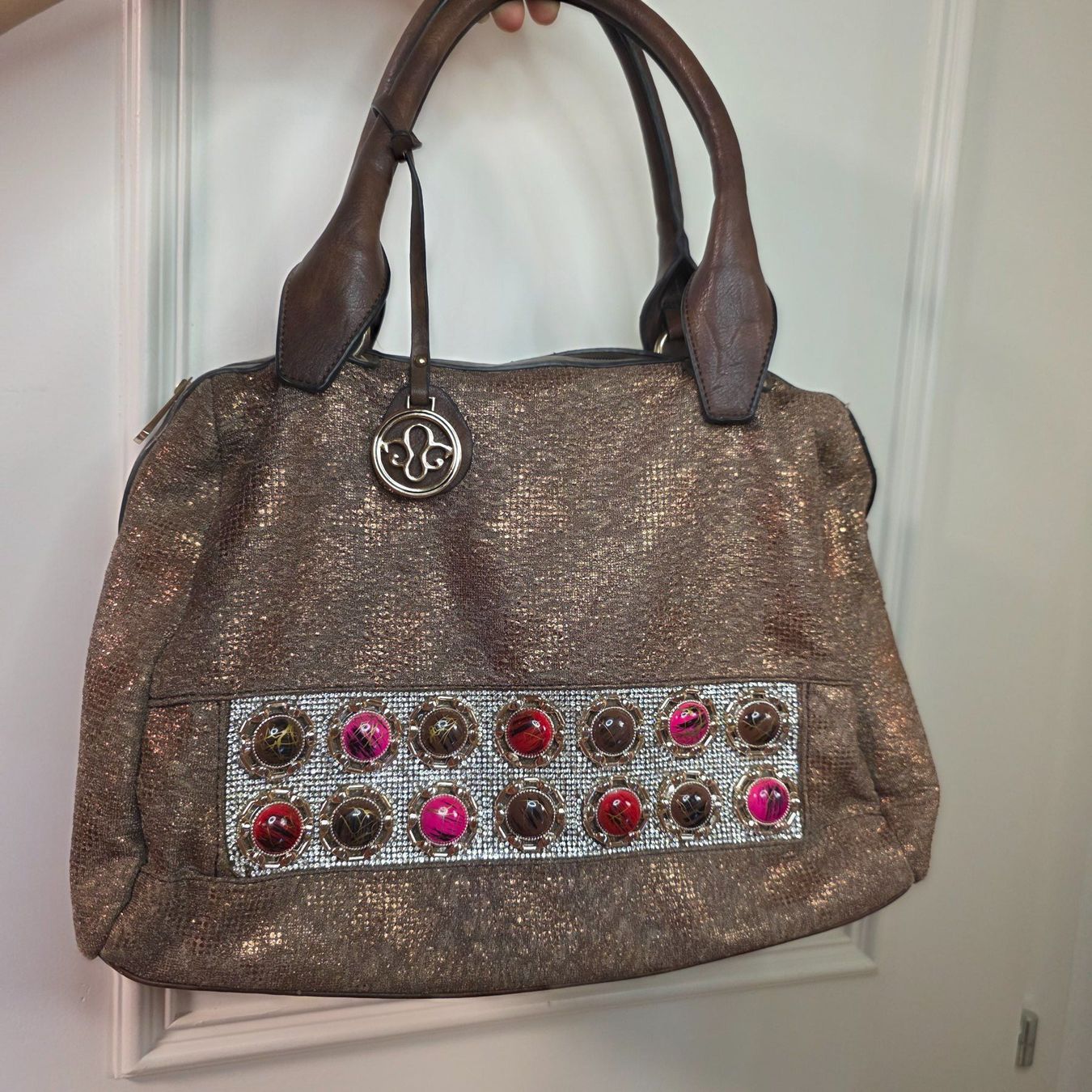 Borse da donna: Bronzefarbene Tasche mit Schmuckdetails – Usato da Wald ZH venduto da CapLux