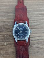 Montre Tissot Actualis femme bracelet cuir usagé à réviser
