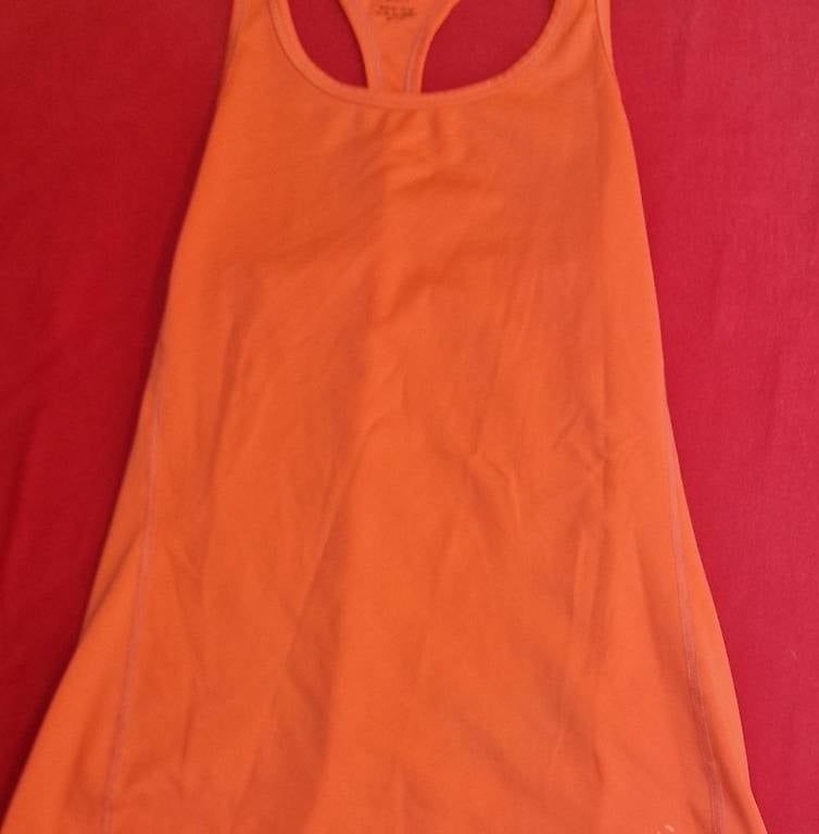 Top: Orange Sport tanktop  – Usato da Riehen venduto da Joloe