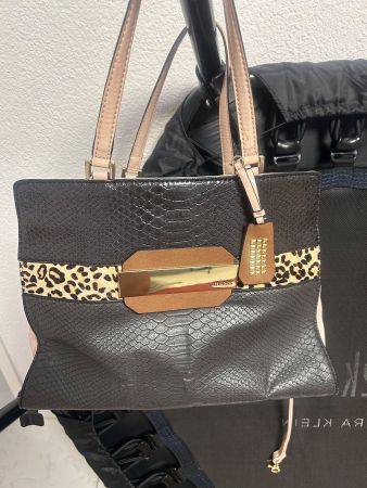 Handtasdche