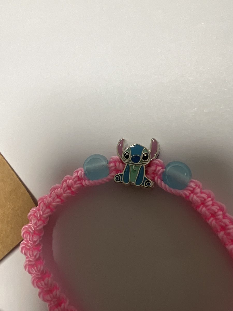 Bracelets: Bracelet rose  Stitch, – Neuf avec emballage d'origine à Chenens par anasantos90 5