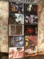 Lot de 10 DVD de films d'action et d'horreur variés.