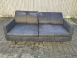 Schwarzes, gebrauchtes Designer - Ledersofa zu verkaufen