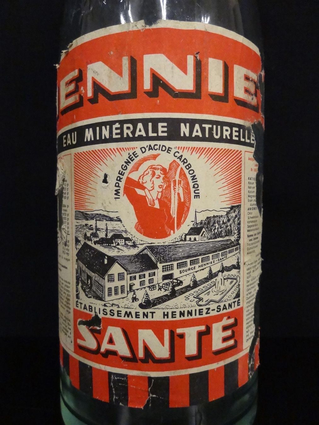 Bicchieri, Caraffe & Bottiglie: alte Flasche HENNIEZ SANTÉ – Usato da Kerzers venduto da Flaschenposten 1