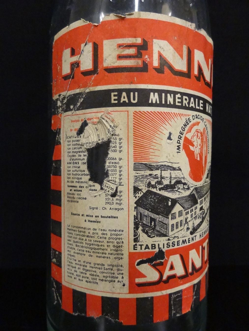 Bicchieri, Caraffe & Bottiglie: alte Flasche HENNIEZ SANTÉ – Usato da Kerzers venduto da Flaschenposten 2
