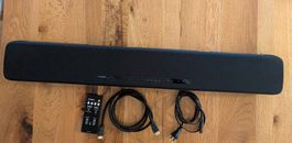 Yamaha Soundbar YAS-107 mit Fernbedienung und Kabeln