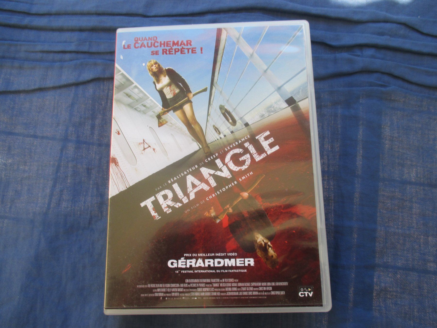 Tous les DVDs: Triangle (C. Smith) – D'occasion à Colombier NE par Nevenma