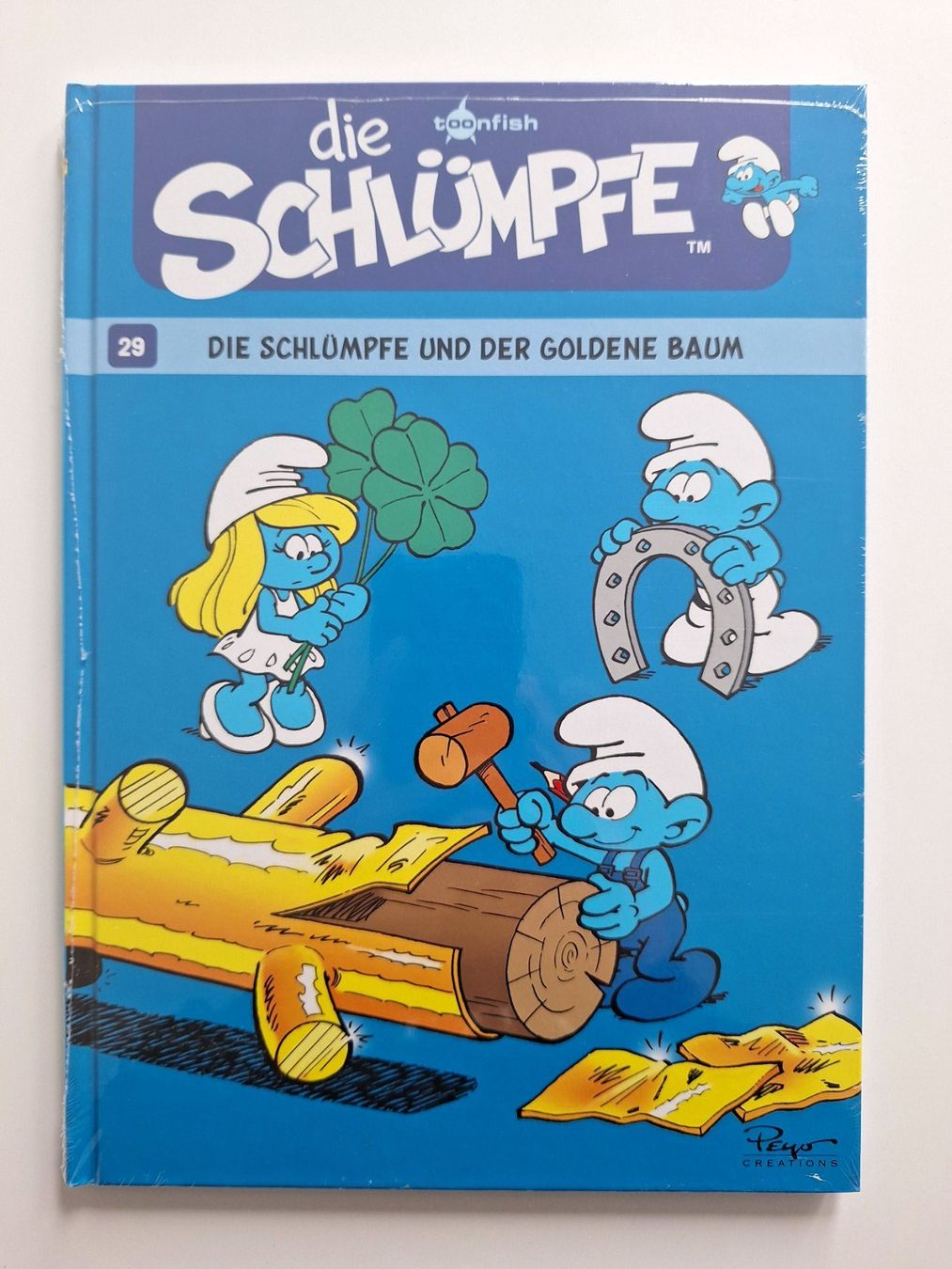 Livres: Die Schlümpfe und der goldene Baum – Neuf avec emballage d'origine à Muri b. Bern par smt_hqn7