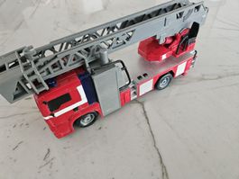 Feuerwehrauto Spielzeug MAN Leiterwagen gebrauchter Zustand