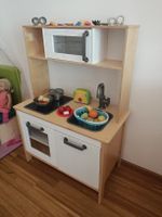 Kinderspielküche aus Holz mit viel Zubehör