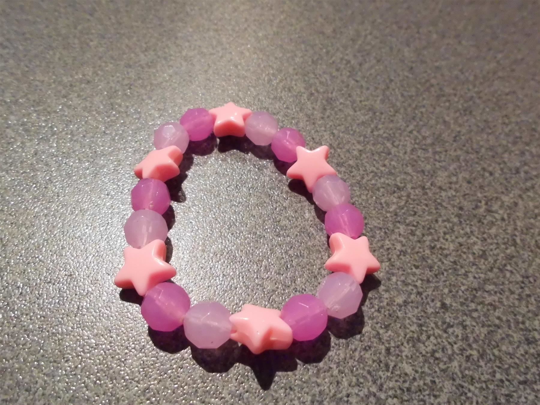 Bracciali & Braccialetti: Armband rosa/violette Sterne – Usato da Zürich venduto da abraxas1291