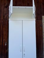 Palmberg Prisma 2 Drehtürenschrank abschliessbar weiss & Auf