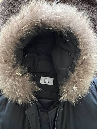Doudoune noire femme capuche fourrure véritable 