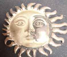 Broche Soleil et Lune argenté 925 état d'usage