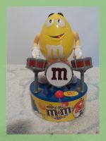 M&M Figur Schlagzeuger gelb Musikspielzeug gebraucht