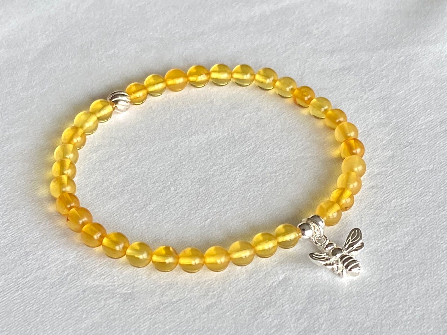 Armbänder & -reifen: Edelstein Armband Honig Bernstein mit Silber auf Mass – Neu und originalverpackt aus Zuzwil SG von Lemliskat 1