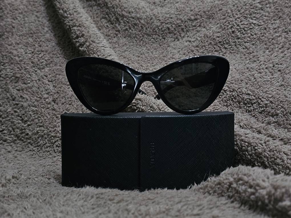 Lunettes & Verres: Lunettes de soleil Prada - il de chat – D'occasion à Sion par TR-