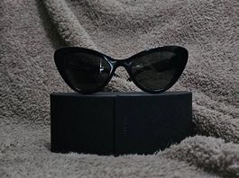 Lunettes de soleil Prada - il de chat