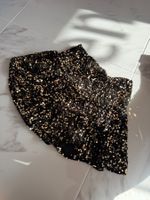 SCHWARZER PAILLETTEN-MINIROCK AUS ITALIEN GR M