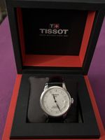 Montre Tissot homme cuir argenté automatique bon état