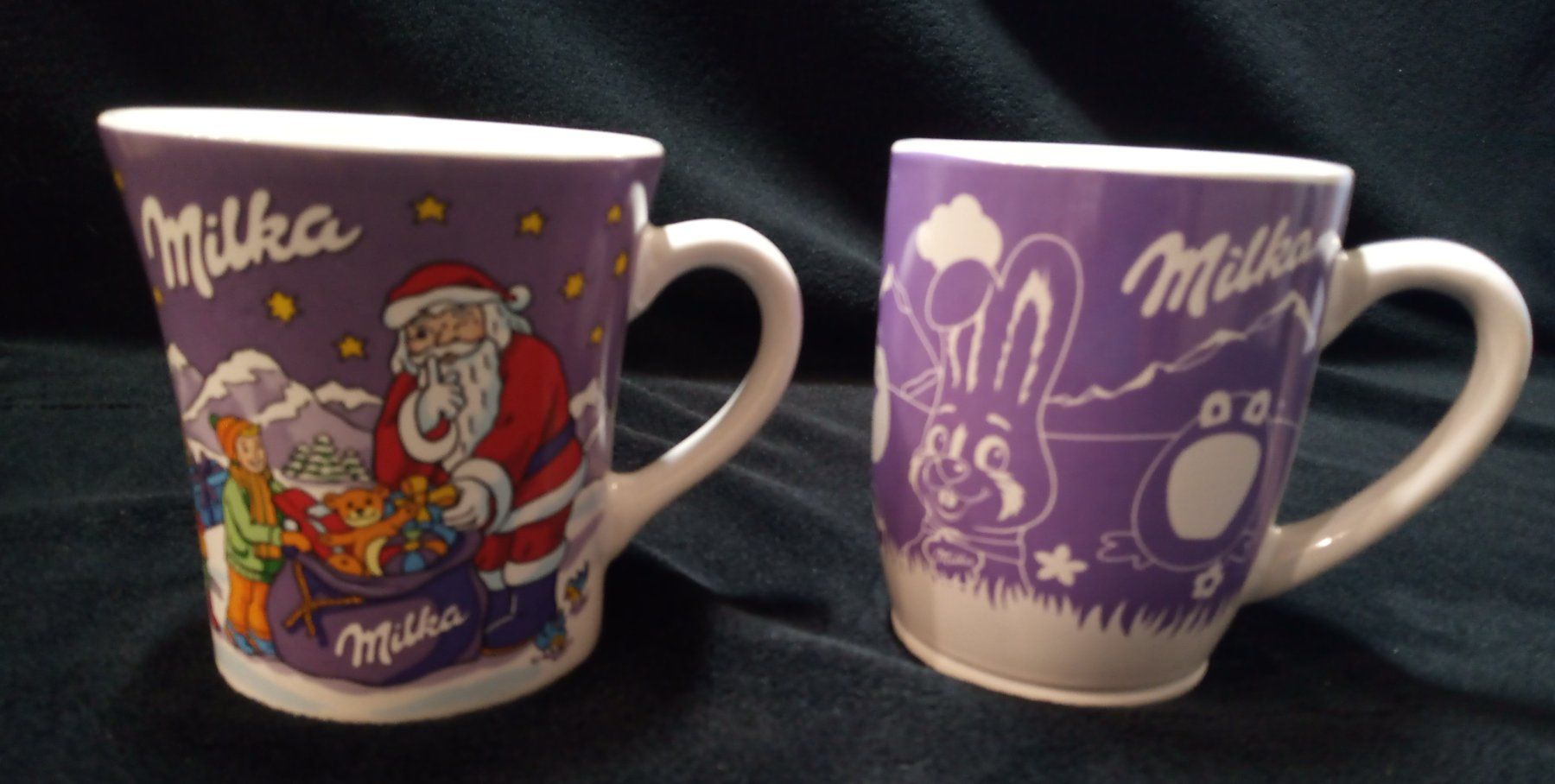 Tazze: Milka 2er Set Sammlertassen - Weihnachtsbecher & Osterbecher – Usato da Werdenberg venduto da EXA-Secondhand